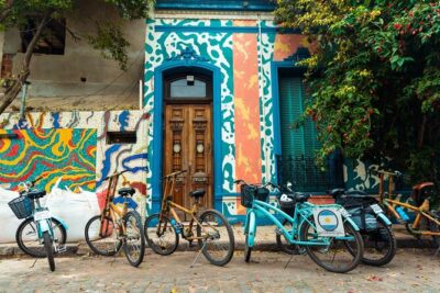 Private Off the Beaten Path: Hidden Urban Art Bike Tour - La Boca and Barracas murals: what you’re really seeing when the walls get huge